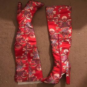 Red, Oriental style thigh high boots.